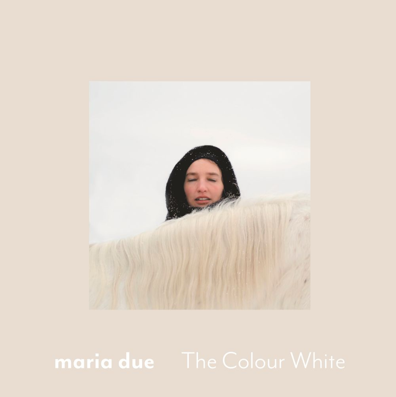Maria Due behind a horse's mane and a text with the album title